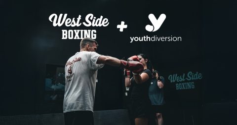 a youth learning to box